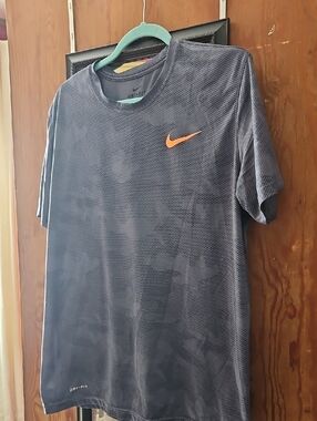 Nike Short Sleeve Dri-FIT Tee in Navy with Orange Swoosh